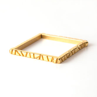 Bamboo Collection. 18 Karat gold over steel square bangle from a vintage auto.