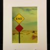 end End. Colorful photo printed with metallic ink, creating an almost 3-D effect. Photo taken in Salton Sea, CA.